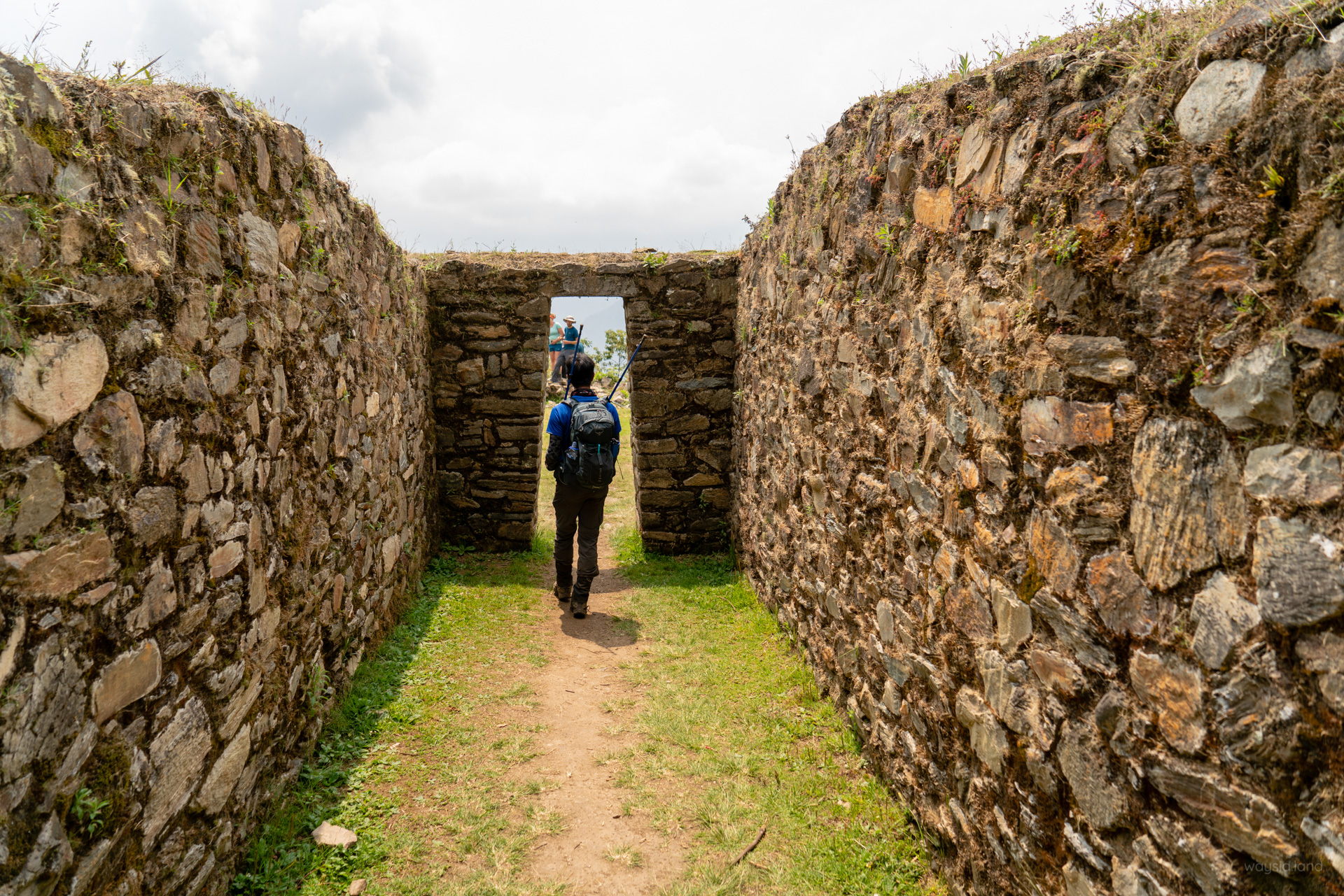 Walking through the Sun Gate at Llactapata.